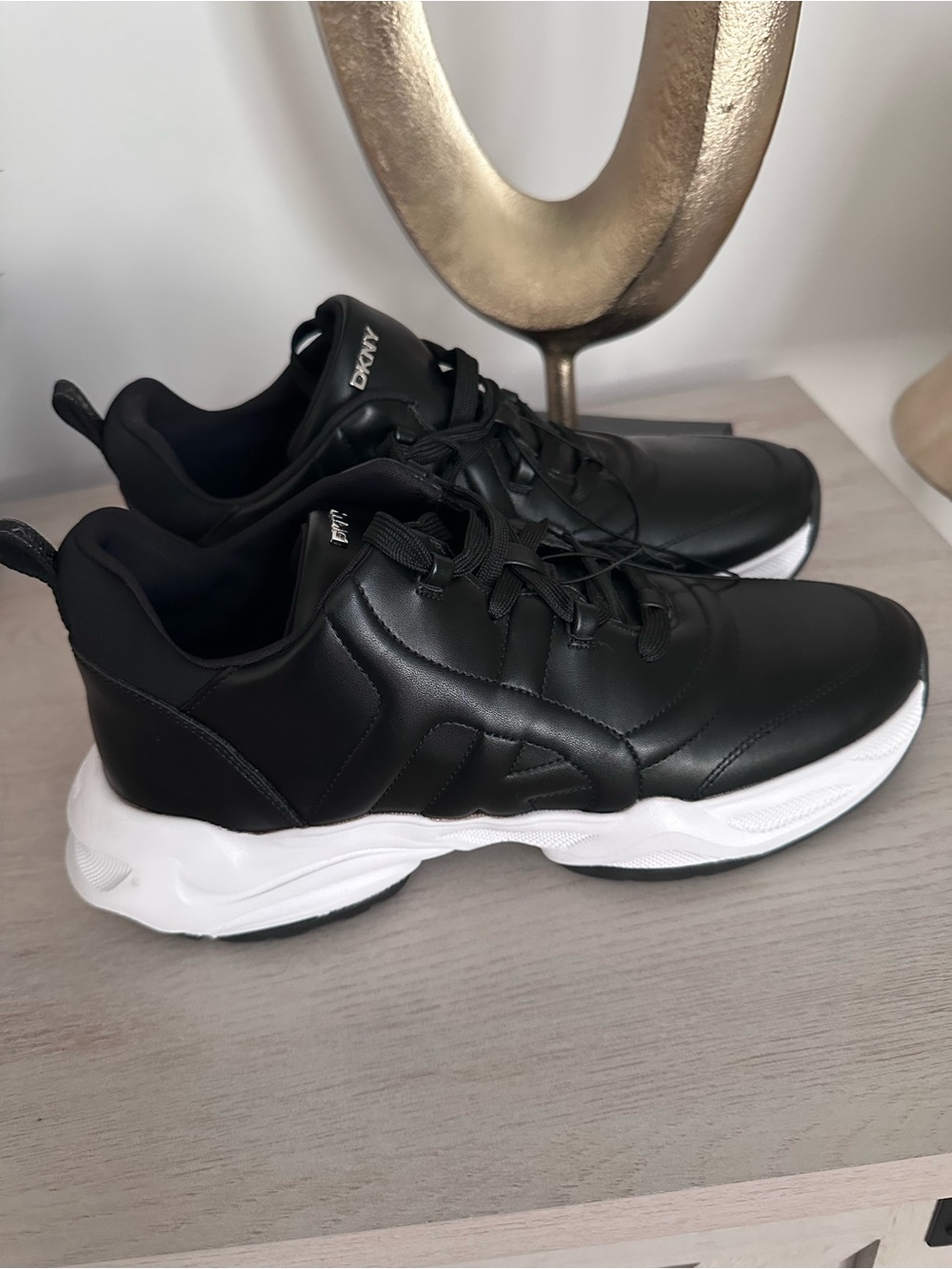 DKNY women’s black Leather Athletic Sneakers